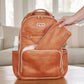 Boss Pouch™ Wallet, Belt Bag and Clutch Diaper Bag Accessory Itzy Ritzy Cognac