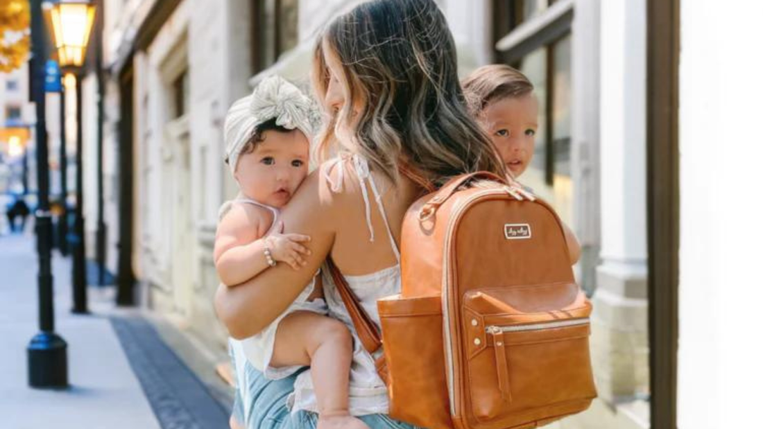 https://www.itzyritzy.com/cdn/shop/articles/a_mother_carrying_her_cute_baby.png?v=1697838184&width=1100