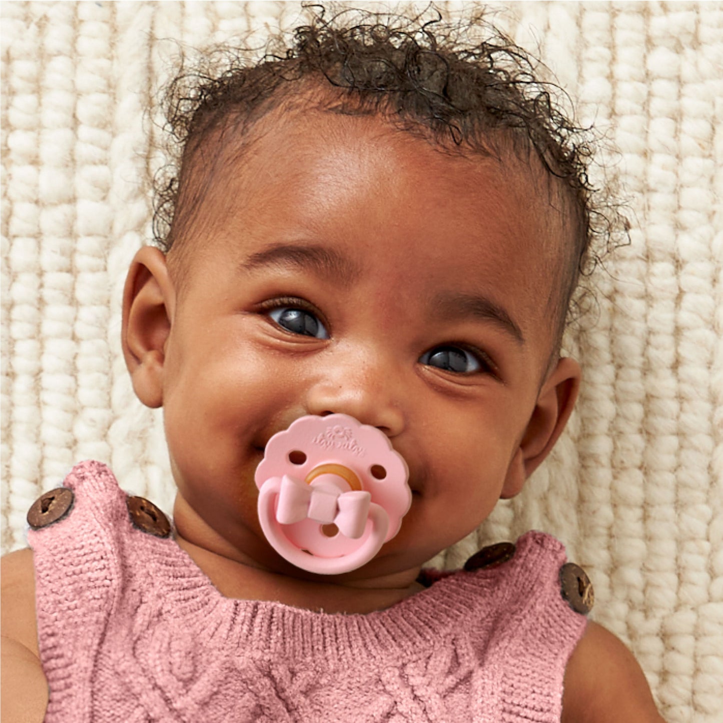 Itzy Soother™ Natural Rubber Pacifier - 6-18M Pink Bows