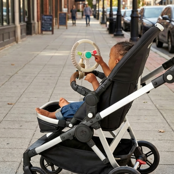 The Bitzy Driver™ spinning steering wheel toy