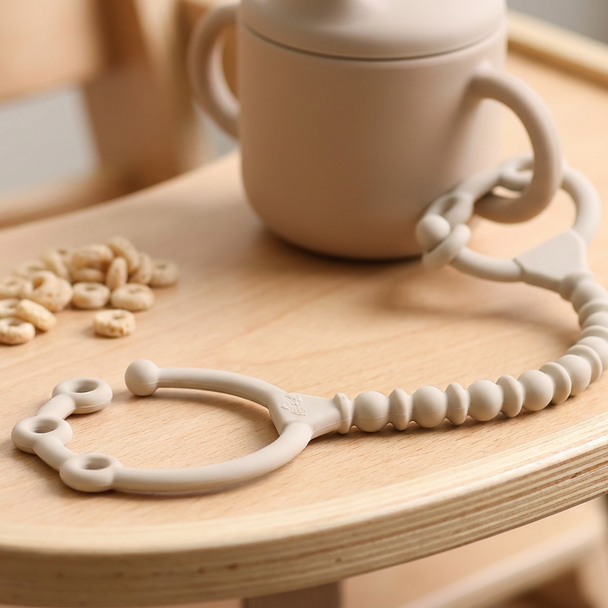  Itzy Strap Pack silicone toy and cup holder. 