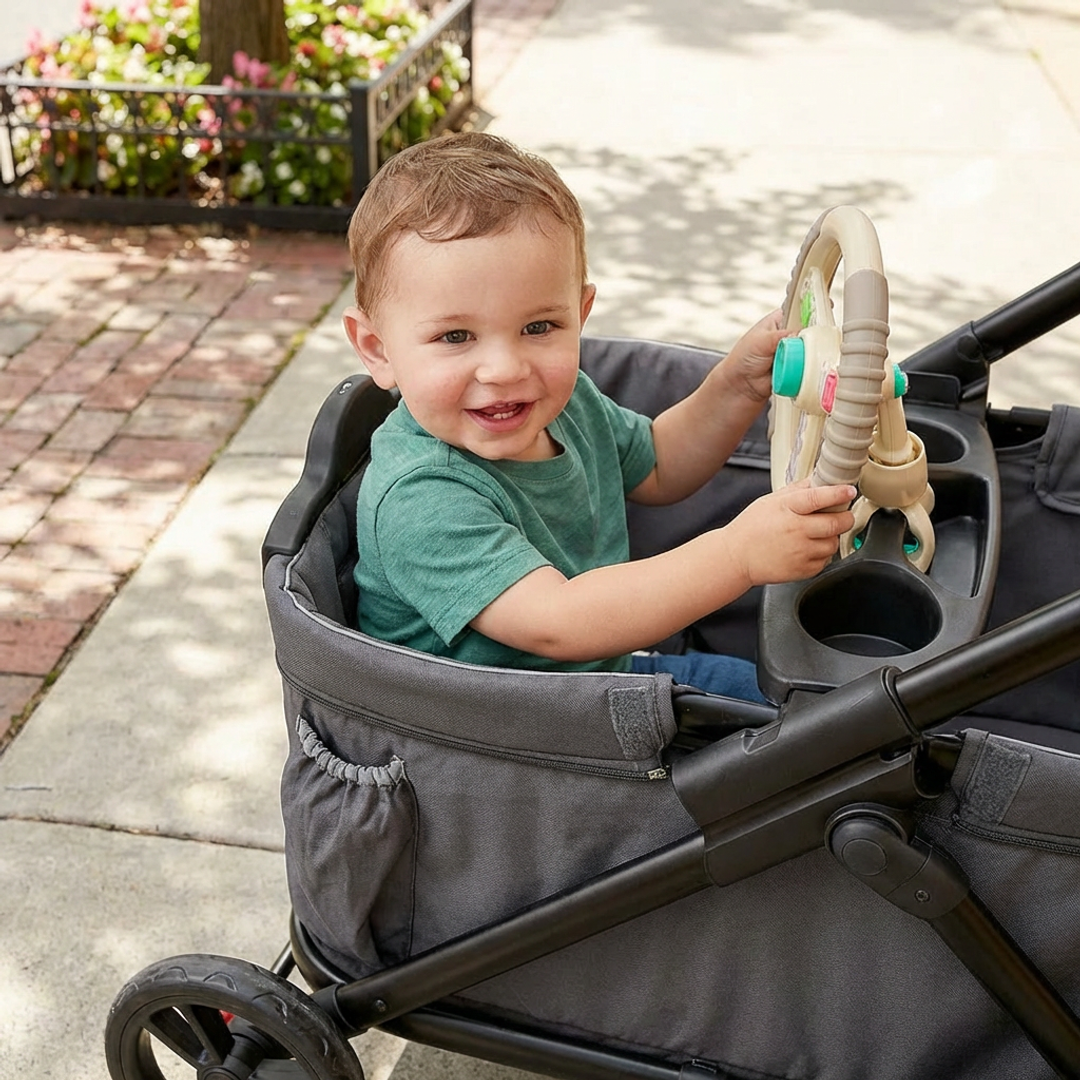 The Bitzy Driver™ spinning steering wheel toy 