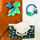Take & Travel Pouch™ Reusable Wipes Case Diaper Bag Accessories Itzy Ritzy® Raining Dinos