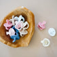 Sweetie Soother™ Orthodontic Silicone Pacifier 6-18M Itzy Ritzy Ballet Slipper & Primrose Toast & Buttercream Sky & Surf