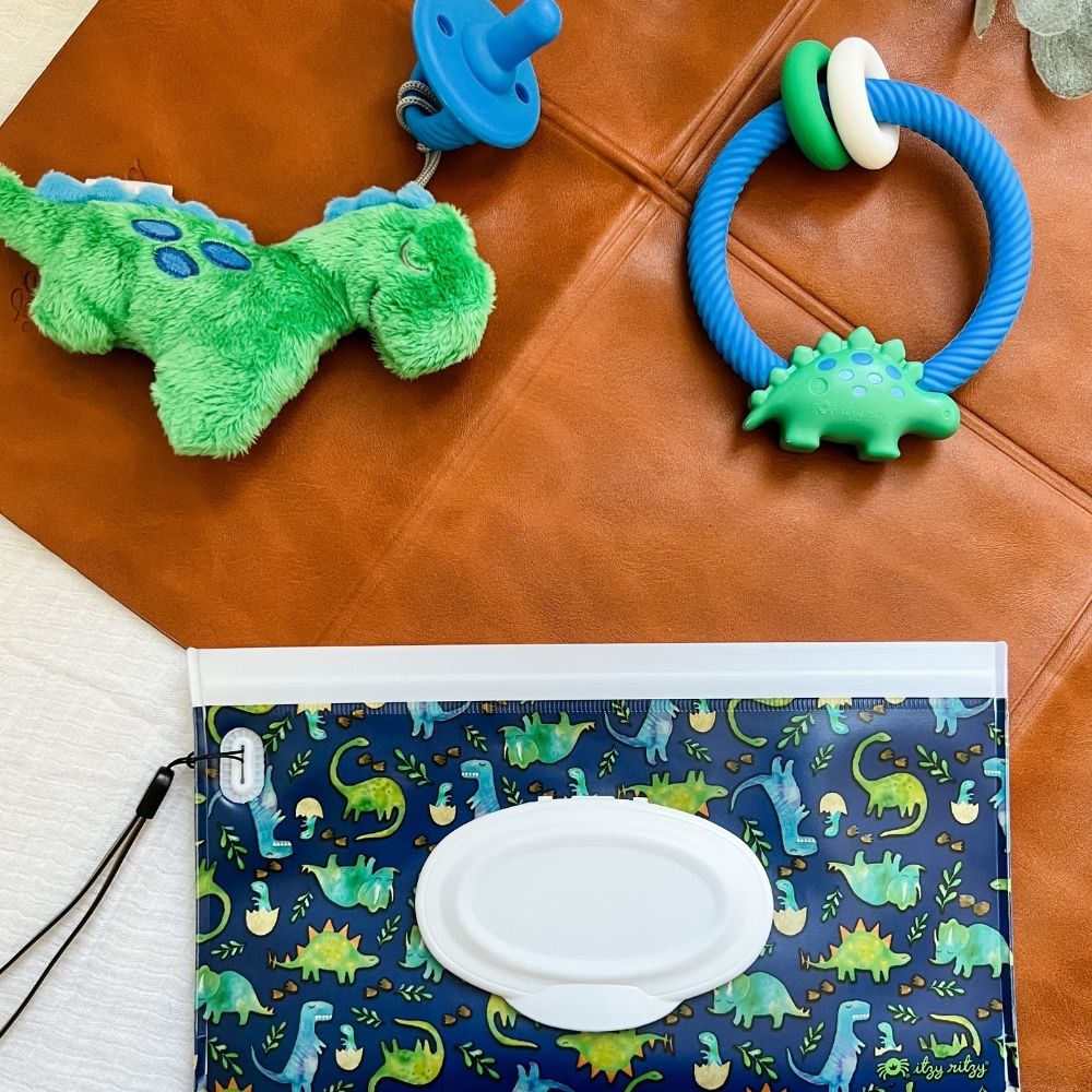 Take & Travel Pouch™ Reusable Wipes Case Diaper Bag Accessories Itzy Ritzy® Raining Dinos