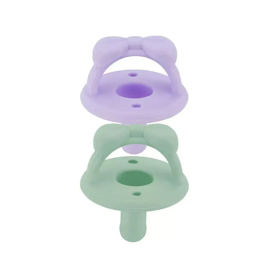 Sweetie Soother™ - Pacifier 2-Pack Pacifiers & Pacifier Accessories Itzy Ritzy Lilac and Mint Bows 