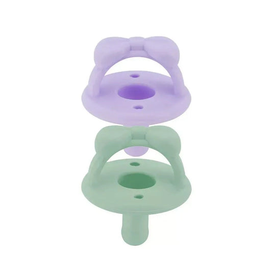 Sweetie Soother™ - Pacifier 2-Pack Pacifiers & Pacifier Accessories Itzy Ritzy Lilac and Mint Bows 